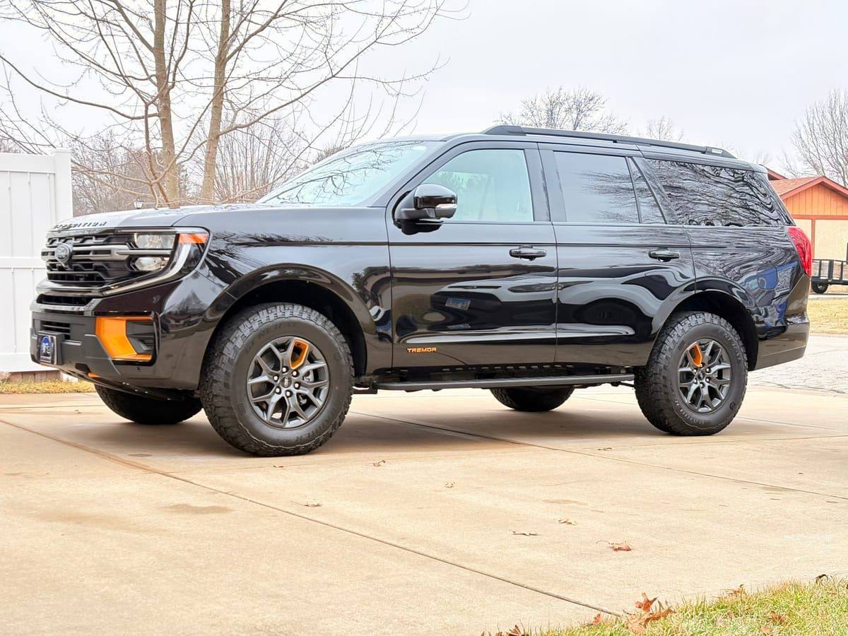 Black Ford Expedition with deep wet-look gloss after detailing in the Metro East