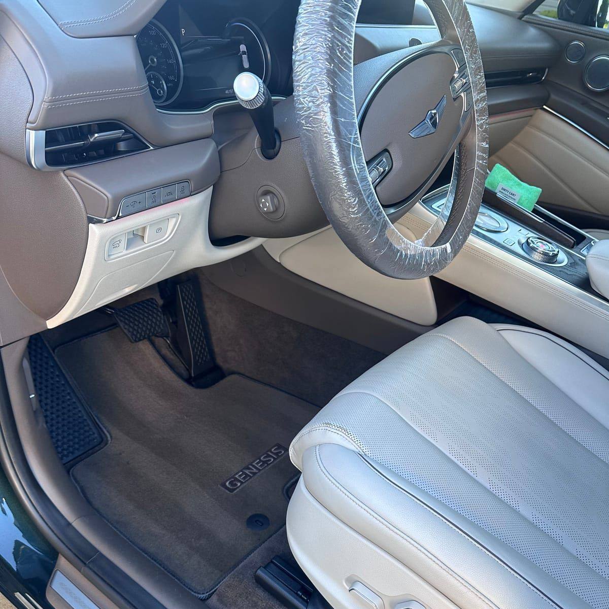 Spotless cream leather SUV interior after a deep interior detail